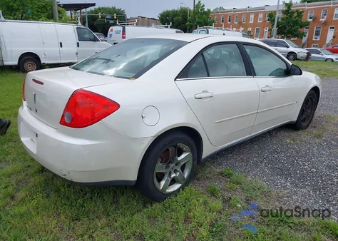 2009 Pontiac G6 из США, поврежденный, VIN 1G2ZG57B094177701